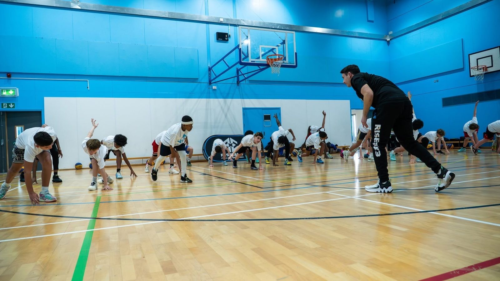 Players warming up at the February RISE 3x3 camp